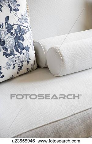 Detail white sofa with floral patterned throw pillow View Large Photo Image Stock Photograph - Detail white sofa with floral patterned throw pillow. Fotosearch