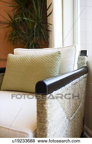 Detail wicker armchair in front of window View Large Photo Image Stock Photo - Detail wicker armchair in front of window. Fotosearch