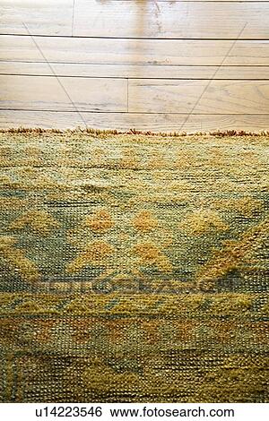 Detail worn down rug and hardwood floor View Large Photo Image Stock Photograph - Detail worn down rug and hardwood floor. Fotosearch