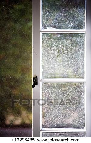 Stock Photography - Dusty Window with Latch and Screen. Fotosearch