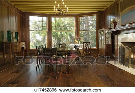 Elegant dining room with bay windows and fireplace View Large Photo Image Stock Photograph - Elegant dining room with bay windows and fireplace. Fotosearch