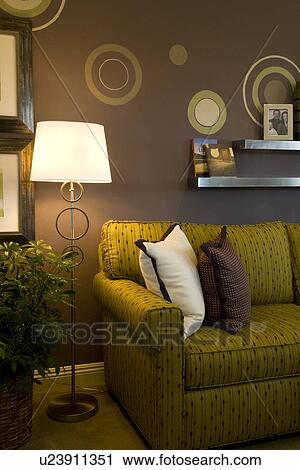 End of retro sofa near floor lamp View Large Photo Image Stock Image - End of retro sofa near floor lamp. Fotosearch