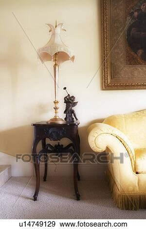 End of sofa and end table in traditional living room View Large Photo Image Stock Photo - End of sofa and end table in traditional living room. Fotosearch
