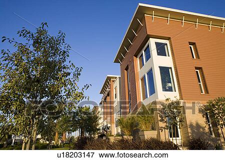 Stock Photo - Exterior facade contemporary loft style homes. Fotosearch