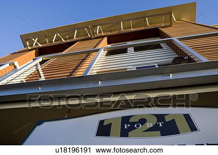Stock Image - Exterior of contemporary loft style condo low angle. Fotosearch