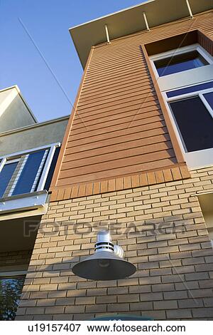 Exterior of contemporary loft style condo low angle View Large Photo Image Stock Photo - Exterior of contemporary loft style condo low angle. Fotosearch