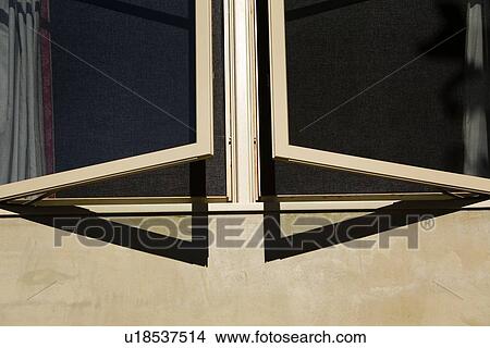 Exterior view open casement window View Large Photo Image Picture - Exterior view open casement window. Fotosearch