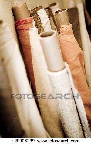 Fabric bolts with various types of fabric View Large Photo Image Stock Photo - Fabric bolts with various types of fabric. Fotosearch