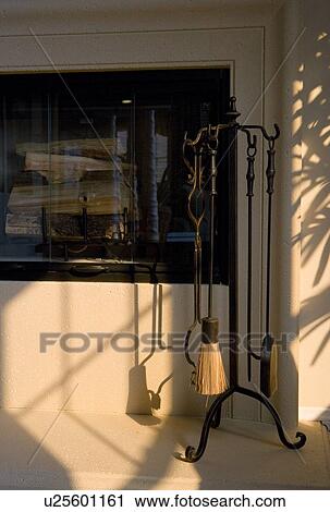 Fireplace tools near fireplace View Large Photo Image Stock Image - Fireplace tools near fireplace. Fotosearch