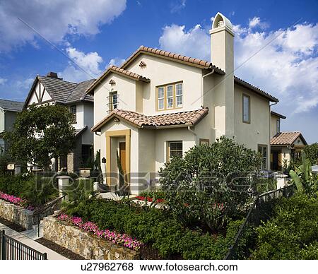 Front exterior contemporary Spanish style home View Large Photo Image Stock Photo - Front exterior contemporary Spanish style home. Fotosearch