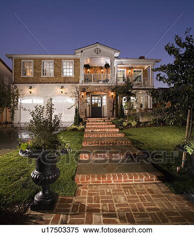 Front exterior multiple story brick shingle style home View Large Photo Image Stock Photography - Front exterior multiple story brick shingle style home. Fotosearch
