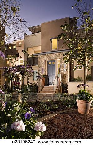 Stock Image - Front Exterior of Contemporary Town home. Fotosearch