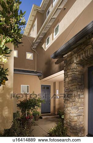 Stock Photo - Front Walk to Front Door of Contemporary Condominium. Fotosearch