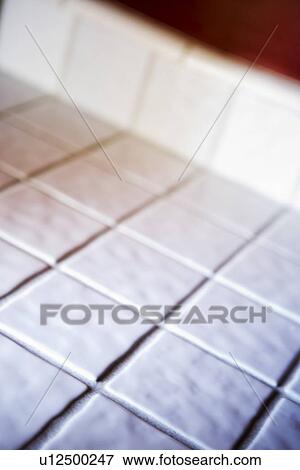 Graphic detail white tile countertop View Large Photo Image Stock Photo - Graphic detail white tile countertop. Fotosearch