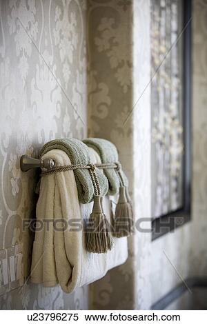 Handle towels on towel bar tied with tassels View Large Photo Image Stock Photography - Handle towels on towel bar tied with tassels. Fotosearch