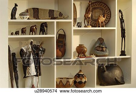 Home display shelves with trinkets and artifacts View Large Photo Image Picture - Home display shelves with trinkets and artifacts. Fotosearch