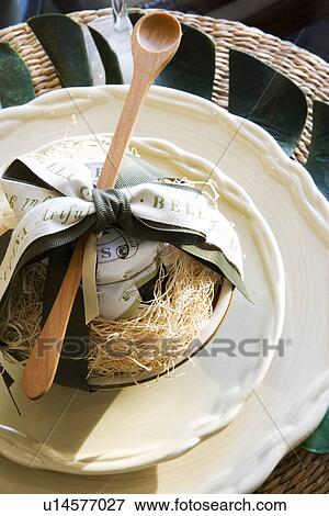 Jar of jam with wooden spoon on place setting View Large Photo Image Stock Photo - Jar of jam with wooden spoon on place setting. Fotosearch