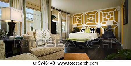 Large Contemporary Master Bedroom with Orange Accents View Large Photo Image Stock Photo - Large Contemporary Master Bedroom with Orange Accents. Fotosearch