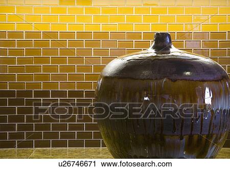 Large decorative vase in front of tiled backsplash View Large Photo Image Stock Image - Large decorative vase in front of tiled backsplash. Fotosearch