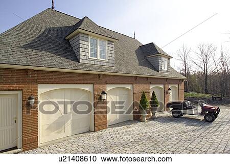 Large four car neo eclectic garage View Large Photo Image Stock Image - Large four car neo eclectic garage. Fotosearch