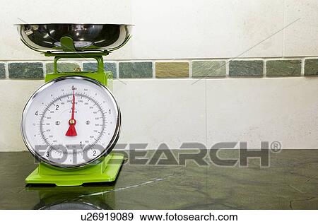 Lime green fruit scale on kitchen counter View Large Photo Image Stock Photo - Lime green fruit scale on kitchen counter. Fotosearch