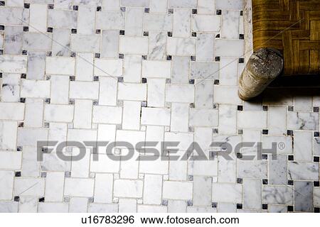 Stock Images Of Marble Tile Floor And Corner Wooden Woven Chair Marble Tile Floor And Corner Of Wooden Woven Chair