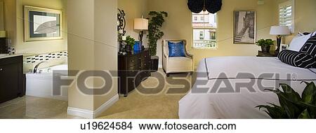 Picture - Master bedroom and bathroom, panoramic. Fotosearch
