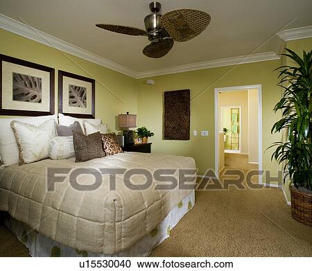 Master Bedroom With Crown Molding And Ceiling Fan Stock Image