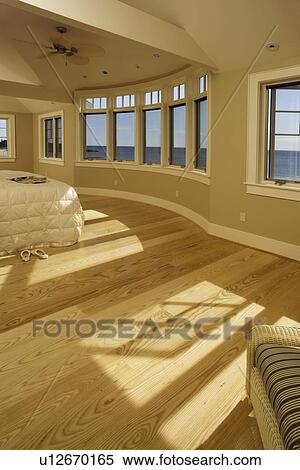 Master bedroom with ocean views and White oak hardwood floors View Large Photo Image Stock Photography - Master bedroom with ocean views and White oak hardwood floors. Fotosearch
