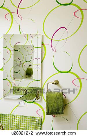 Mirror and hand towel on bright bathroom wall View Large Photo Image Stock Image - Mirror and hand towel on bright bathroom wall. Fotosearch