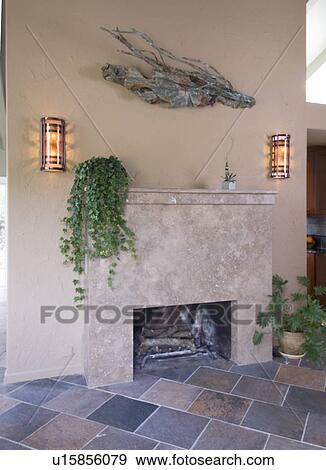 Outdoor fireplace with wall lighting View Large Photo Image Stock Photo - Outdoor fireplace with wall lighting. Fotosearch