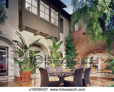 Outdoor patio of neo eclectic home View Large Photo Image Stock Photo - Outdoor patio of neo eclectic home. Fotosearch
