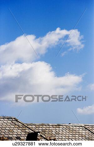 Stock Image - Roof Detail with Blue Sky. Fotosearch