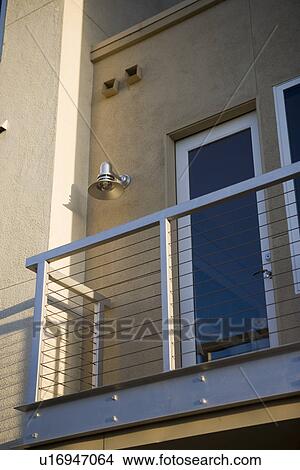 Small balcony off side of contemporary loft style condo View Large Photo Image Picture - Small balcony off side of contemporary loft style condo. Fotosearch