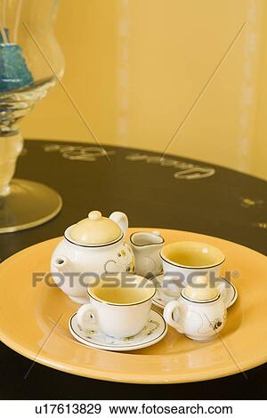 Small child's tea set View Large Photo Image Stock Photo - Small child's tea set. Fotosearch