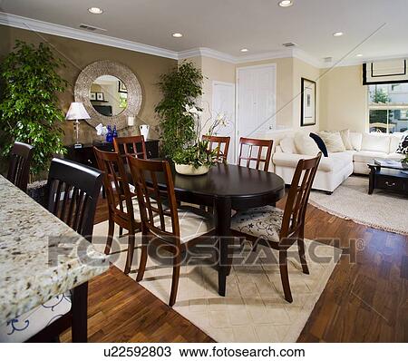 small dining area between kitchen and living room View Large Photo Image Stock Image - small dining area between kitchen and living room. Fotosearch