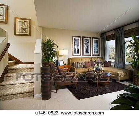 Small sitting area at bottom of L Shaped staircase View Large Photo Image Stock Image - Small sitting area at bottom of L Shaped staircase. Fotosearch