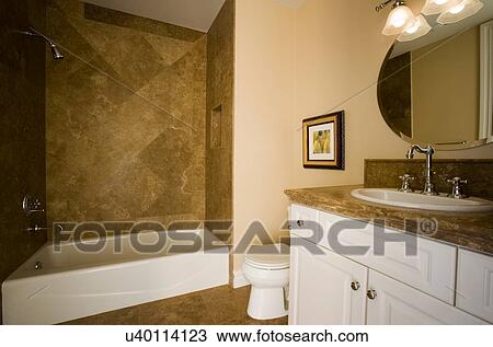 Small traditional bathroom with tub and shower View Large Photo Image Stock Image - Small traditional bathroom with tub and shower. Fotosearch
