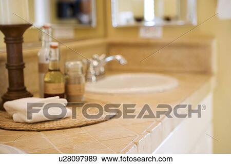 Stock Photo - Stone tile bathroom countertop. Fotosearch