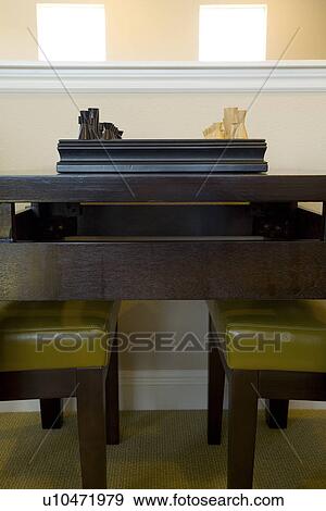Symmetrical view of chess set on table with contemporary green chairs View Large Photo Image Stock Photo - Symmetrical view of chess set on table with contemporary green chairs. Fotosearch