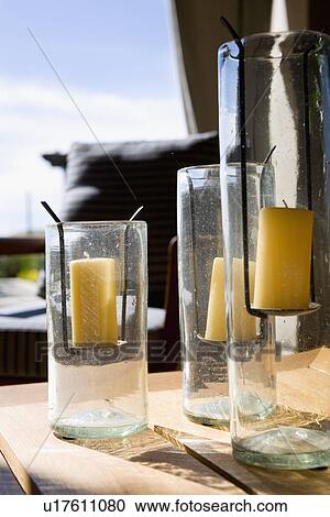 Three candles in jars View Large Photo Image Stock Image - Three candles in jars. Fotosearch