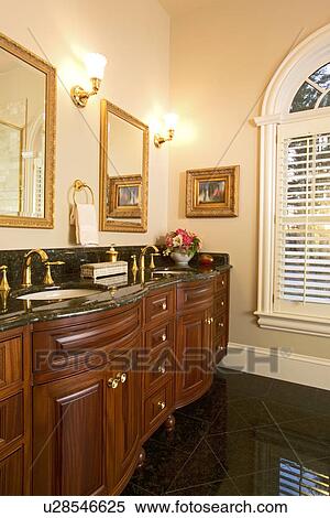 Traditional bathroom with granite floors and countertop View Large Photo Image Stock Photography - Traditional bathroom with granite floors and countertop. Fotosearch