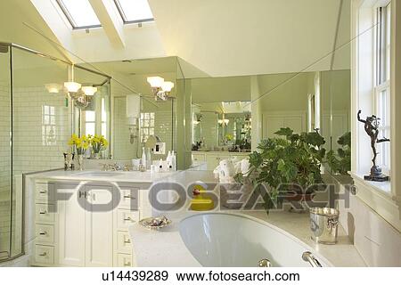 Traditional bathroom with pitched ceiling View Large Photo Image Stock Photo - Traditional bathroom with pitched ceiling. Fotosearch