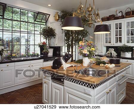 Stock Photo - Traditional Black and white kitchen. Fotosearch