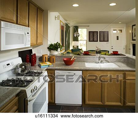 Picture - Traditional kitchen and living room. Fotosearch