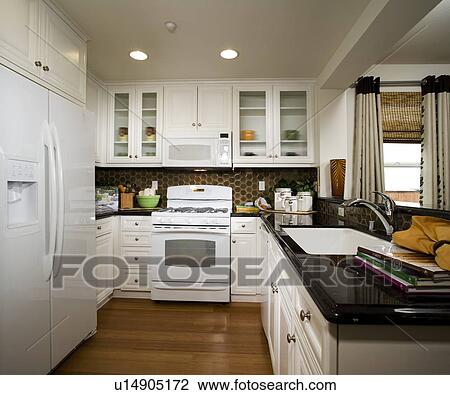 Stock Image - Traditional Kitchen with Tiled Backsplash. Fotosearch
