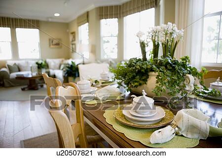 Traditional place settings on wooden dining table View Large Photo Image Stock Image - Traditional place settings on wooden dining table. Fotosearch