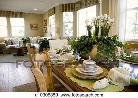 Traditional place settings on wooden dining table View Large Photo Image Stock Photo - Traditional place settings on wooden dining table. Fotosearch