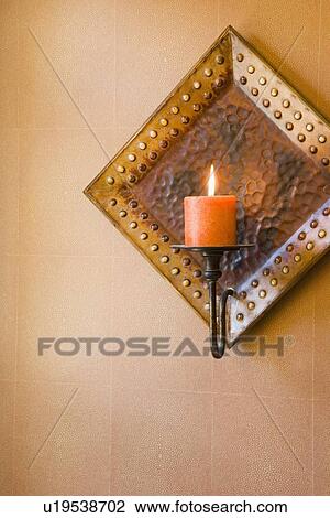 Wall sconce with burning candle View Large Photo Image Stock Image - Wall sconce with burning candle. Fotosearch