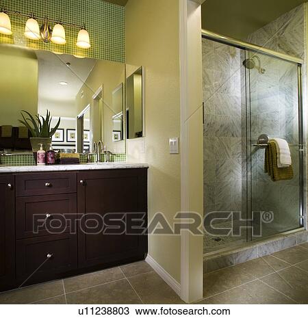 Warm Bathroom with Shower with green accents View Large Photo Image Stock Image - Warm Bathroom with Shower with green accents. Fotosearch